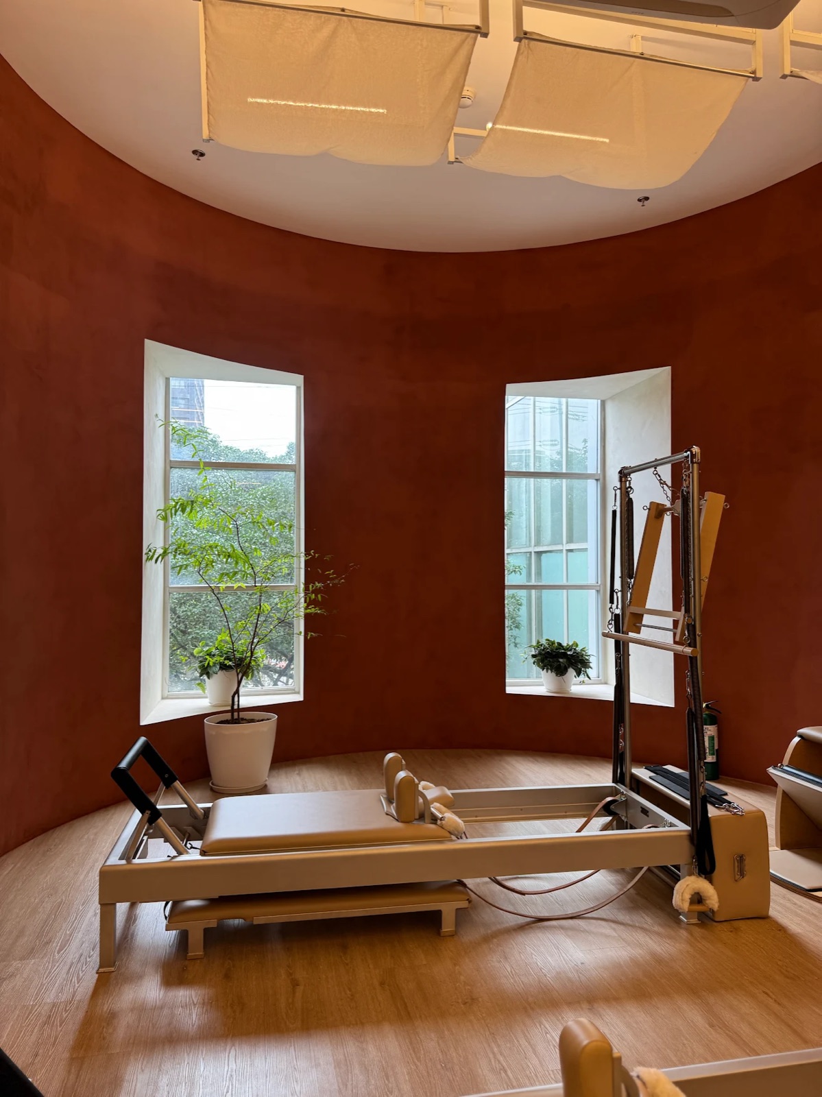 The group room, with its red feature wall and arched windows